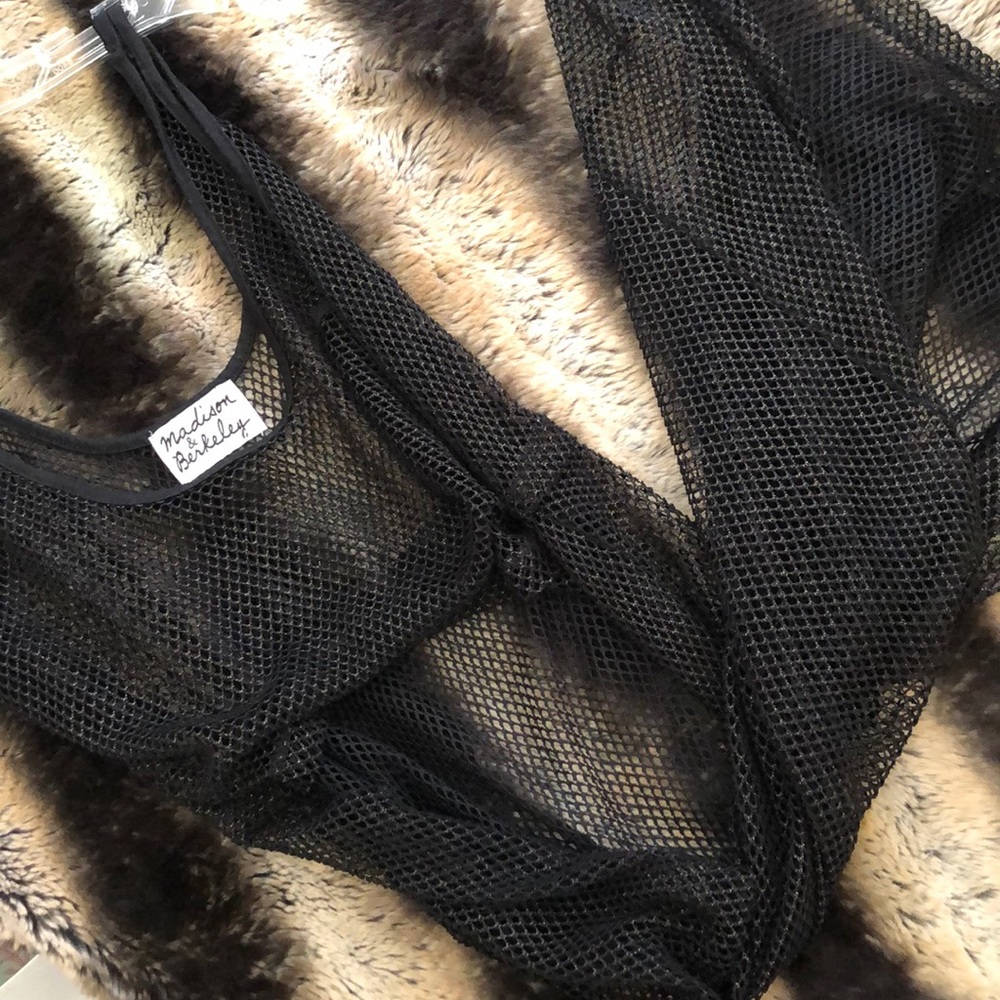 Cropped, long in the back tank top